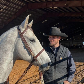 James Zink with white horse